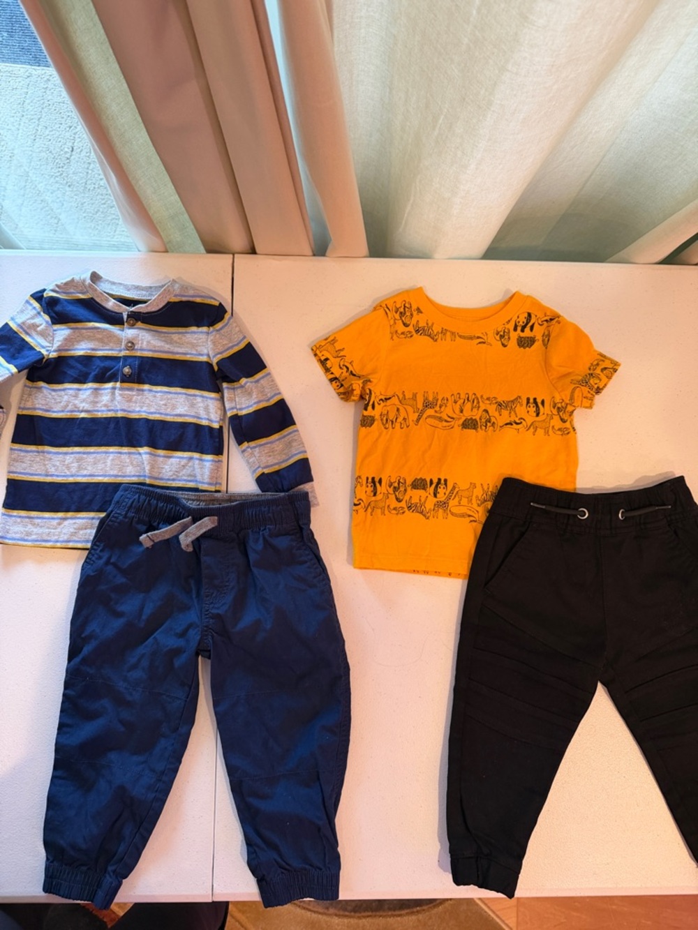 (2) sets - canvas pants, cotton shirts 1 long &  1 short sleeve. 18  months